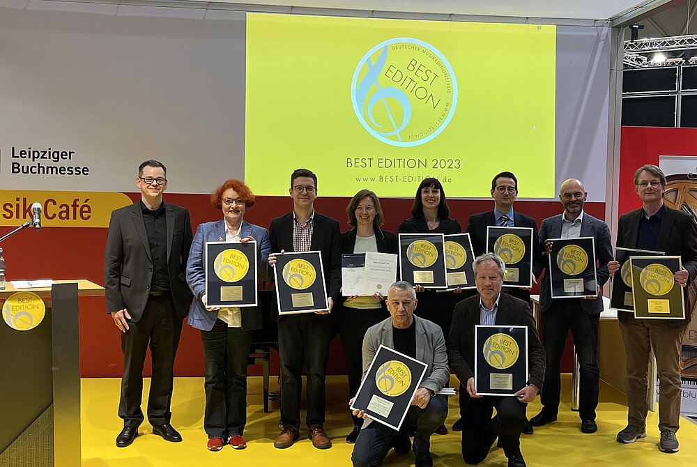 Vizepräsident Clemens Scheuch mit den Preisträger:innen auf der Leipziger Buchmesse